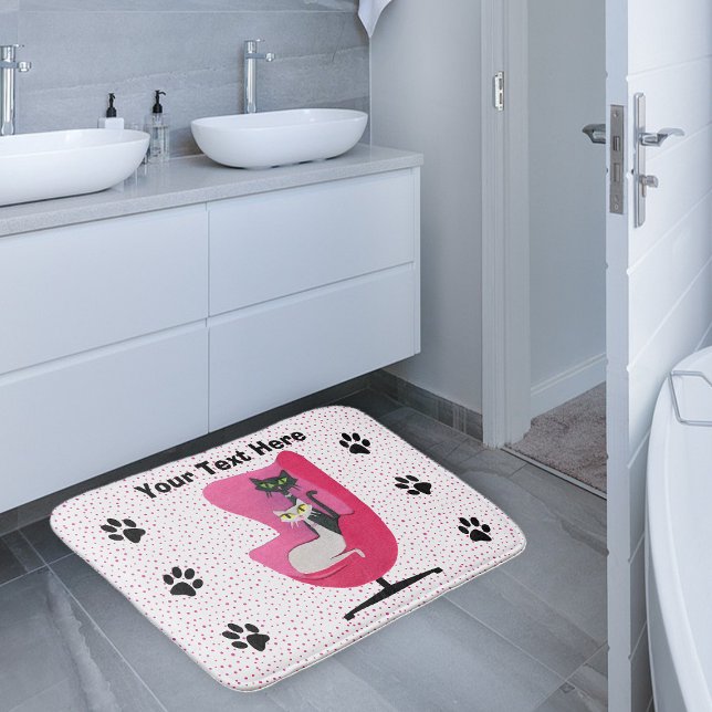 Sophisticated Cats in Pink Chair Diamonds Dots Bath Mat (Two cats in mid century style pink chair paw prints polka dots on white bath mat.)