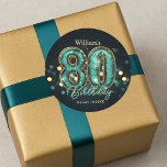 Sophisticated Chic Teal and Gold 80th Birthday Classic Round Sticker<br><div class="desc">This sticker features a sophisticated dark backdrop softly illuminated by bokeh lights in harmonious teal and golden hues. The magnificent '80' takes centre stage, crafted with a luxurious, textured teal finish that evokes the look of precious mosaic tiles, all magnificently outlined in shimmering antique gold. But here's the best part:...</div>