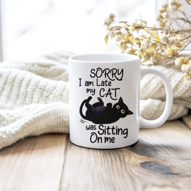 "Sorry I'm Late My Cat Was Sitting on Me" Coffee Mug ("Sorry I'm Late My Cat Was Sitting on Me" Coffee Mug on a neutral cozy wooden table.)