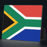 South African Flag Plaque<br><div class="desc">Add a touch of South African pride to your decor with our exclusive plaque featuring the flag of South Africa! Crafted with meticulous attention to detail, this plaque is not just a decorative item; it’s a celebration of South Africa’s vibrant culture and heritage. The stylish design prominently displays the iconic...</div>