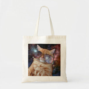 Space cat wearing sunglasses tote bag