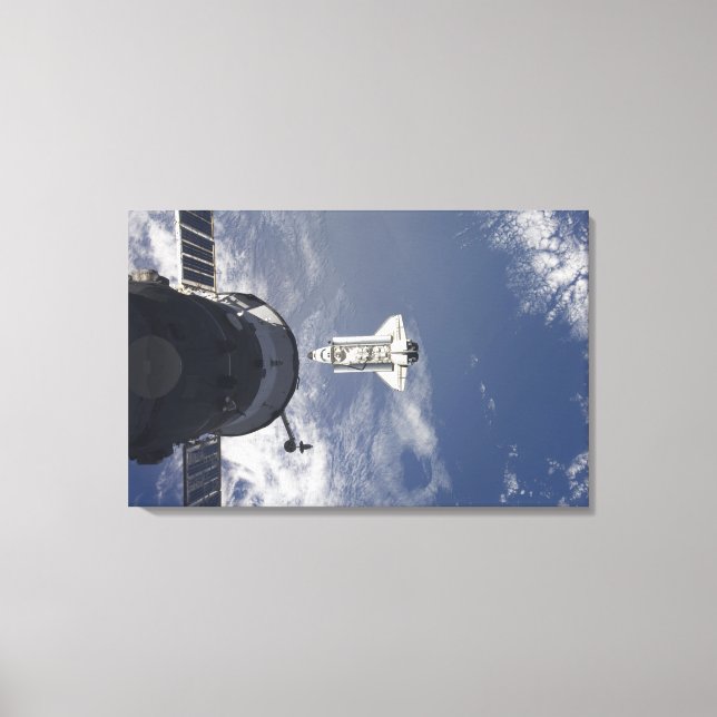 Space Shuttle Atlantis and a Russian spacecraft Canvas Print (Front)