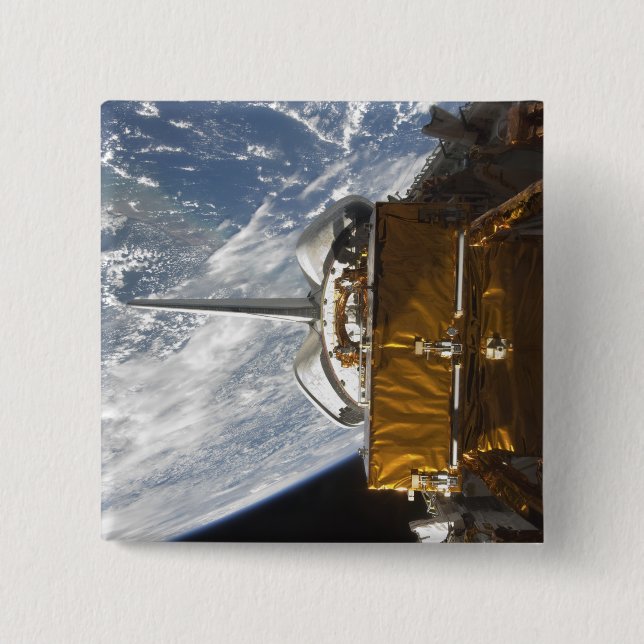 Space Shuttle Atlantis' payload bay backdropped 15 Cm Square Badge (Front)