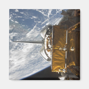 Space Shuttle Atlantis' payload bay backdropped Magnet