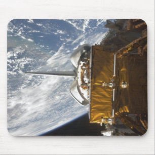 Space Shuttle Atlantis' payload bay backdropped Mouse Pad