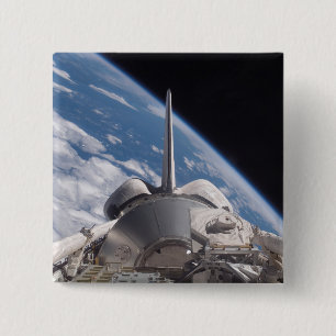 Space Shuttle Discovery backdropped by Earth 15 Cm Square Badge