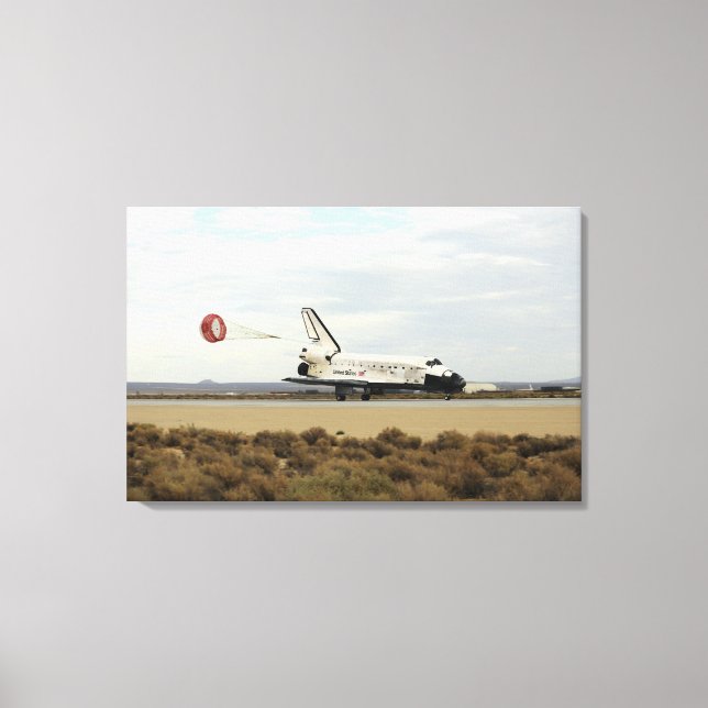 Space Shuttle Discovery deploys its drag chute Canvas Print (Front)