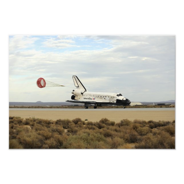Space Shuttle Discovery deploys its drag chute Photo Print (Front)