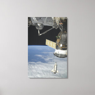 Space shuttle Endeavour, a Soyuz spacecraft Canvas Print