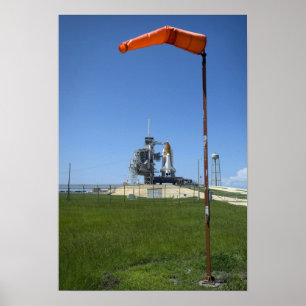 Space shuttle Endeavour is framed by a windsock Poster