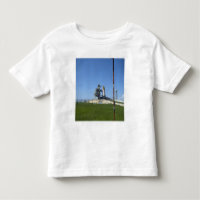 Space shuttle Endeavour is framed by a windsock