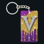 Sparkling Letter V With Gold Glitter Drip Key Ring<br><div class="desc">Sparkling diamond-encrusted letter V set against a gold glitter field with dripping metallic effect and vivid purple background,  evoking luxury,  glam monogram style,  celebration and high-fashion bling.</div>