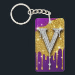 Sparkling Letter V With Gold Glitter Drip Key Ring<br><div class="desc">Sparkling diamond-encrusted letter V set against a gold glitter field with dripping metallic effect and vivid purple background,  evoking luxury,  glam monogram style,  celebration and high-fashion bling.</div>