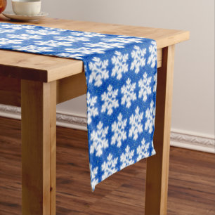 Sparkling white snowflakes blue background short table runner