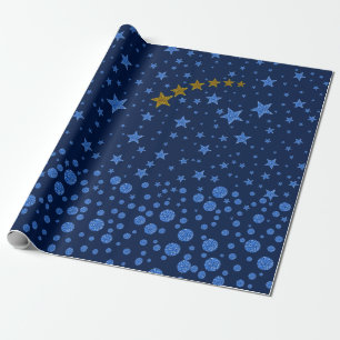 Sparkly blue stars on blue wrapping paper