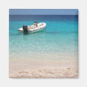 Speedboat in the blue sea magnet