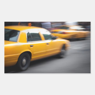 Speeding Yellow NY City Taxi Cab with Motion Blur Rectangular Sticker