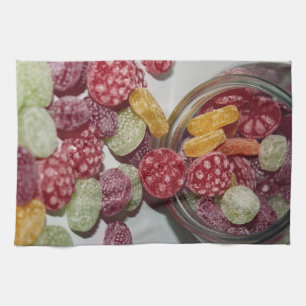 Spilled hard fruit candy from jar - Kitchen Tea Towel