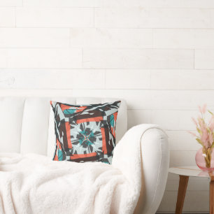 Spinning Tile Design in Orange, Black, and Aqua Cushion
