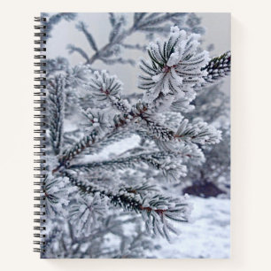 Spiral notebook with Christmas tree under the snow