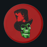 Spooky Green Skull with Top Hat Magnet<br><div class="desc">A green creepy skull in a black top hat,  with a splatter of red.  Spooky for Halloween!  Fully customisable too,  in case you want to add your own text,  change background colours,  or move elements around.  Make it yours,  make it unique,  make it scary!!</div>