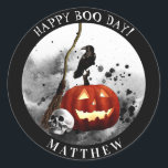 Spooky Halloween Birthday Pumpkin Crow Skull    Classic Round Sticker<br><div class="desc">These spooky Halloween stickers are perfect for a Halloween birthday party, as a party favour or as an envelope seal for Halloween birthday party invitations. These stickers for Halloween birthday feature a black splotched ink background with a fiery jack o'lantern, human skull, black crow, and a witches broom. Personalise with...</div>