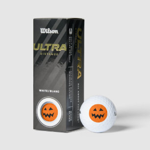 Spooky orange Halloween pumpkin head carving Golf Balls