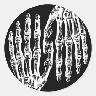 Spooky skeletal hands classic round sticker