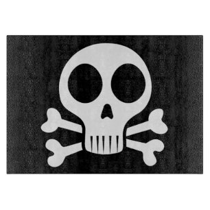 spooky skull on a black background cutting board