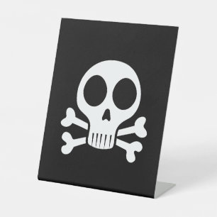 spooky skull on a black background pedestal sign