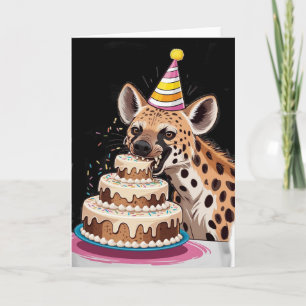 Spotted hyena wearing hat biting into cake card