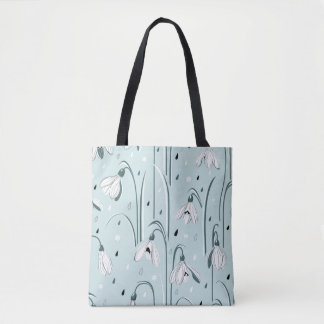 Spring background with delicate snowdrop flowers a tote bag