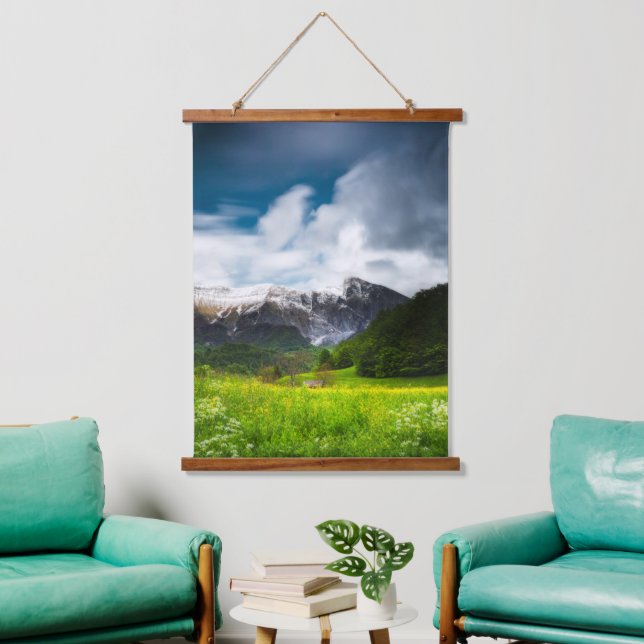 Spring flower field under mountain Krn Hanging Tapestry (Living Room)