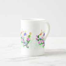 spring flowering branch and colourful  birds