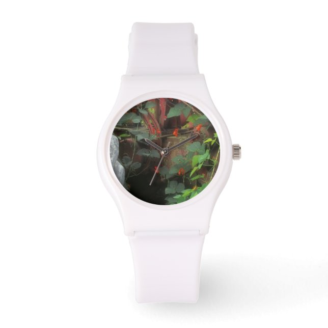 Spring flowers adorn an old tractor. watch (Front)