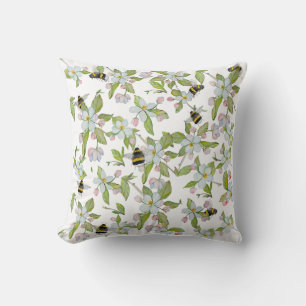 Spring garden blooms and bumblebees cushion
