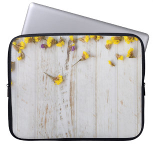 Spring yellow flowers, white plank decor. laptop sleeve