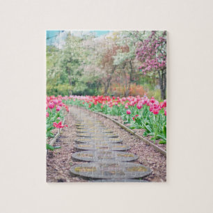 Springtime Flowers Along Stone Walkway Jigsaw Puzzle
