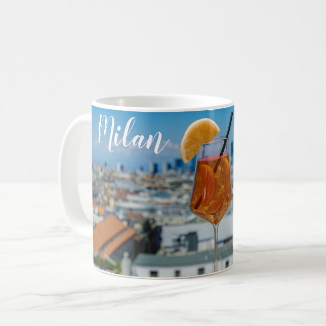 Spritz cocktail on a table with view of Milan Coffee Mug (Front Left)