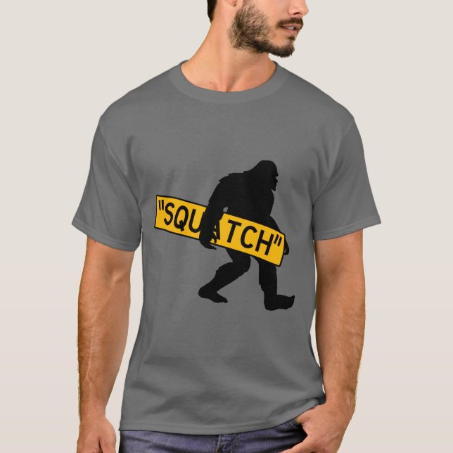 Squatch, Sasquatch, Bigfoot Carrying Squatch Sign T-Shirt (Front)