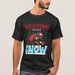 Squatching Through the Snow Christmas Bigfoot Funn T-Shirt