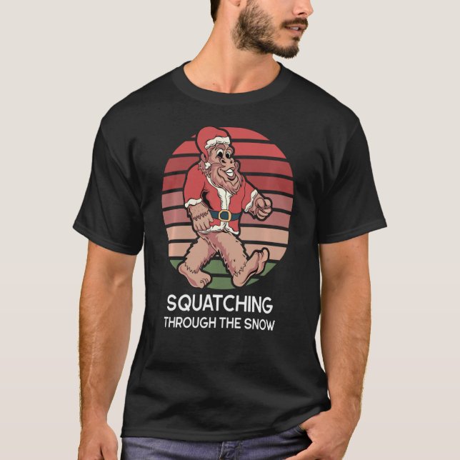 Squatching Through The Snow Funny Sasquatch Christ T-Shirt (Front)