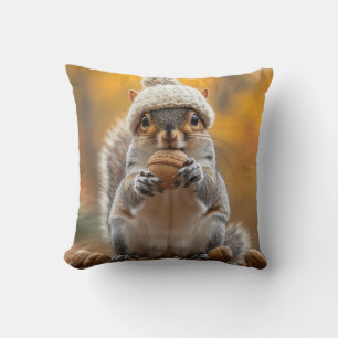 Squirrel in Knit Hat Holding Nut Cushion