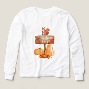 Squirrel on sign with pumpkins and leaves