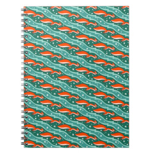 Squirrels jumping in the snow on a Christmas tree Notebook
