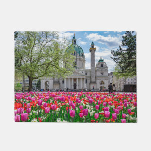 St. Charles Church in spring in Vienna, Austria Doormat
