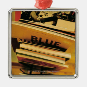 Stack of books and magazines metal tree decoration