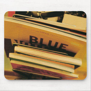 Stack of books and magazines mouse pad