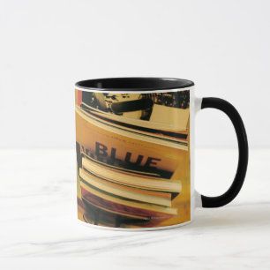 Stack of books and magazines mug