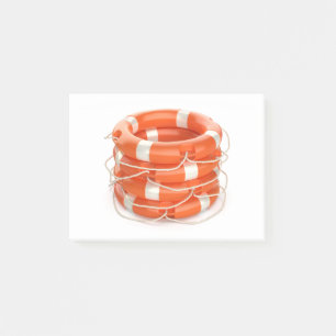Stack with four lifebuoy rings post-it notes